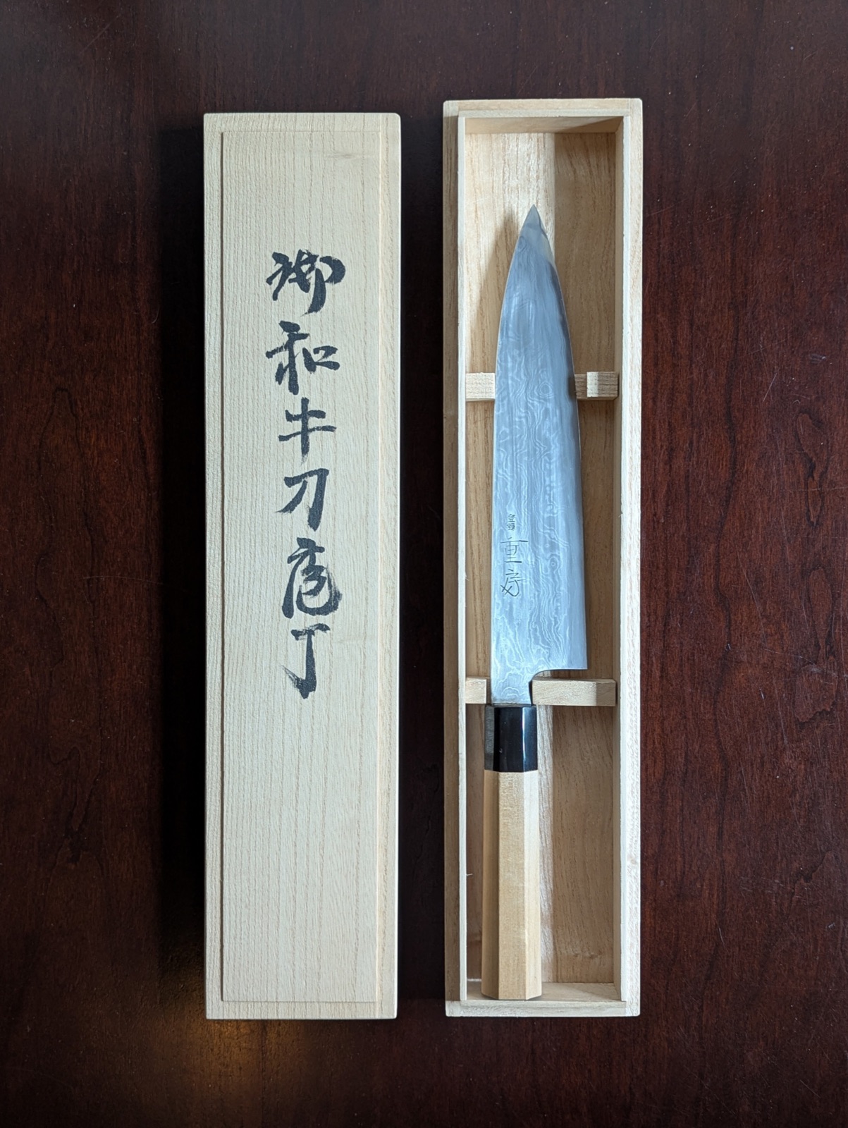 Shigefusa kitaeji wa-gyuto in its kiri wood presentation box, viewed from above